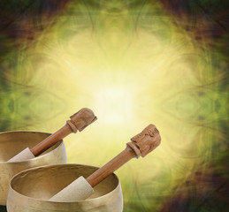 Tibetan Singing Bowls - two bowls cropped in bottom left corner with space for copy all around on a circular mustard yellow Eastern theme pattern background
