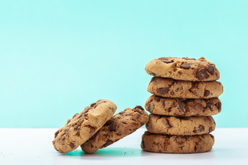Fototapeta na wymiar chocolate chunk cookies on a bright blue background