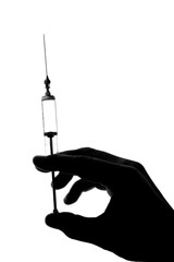 old glass syringe in hand