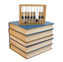 Wooden abacus on a pile of books
