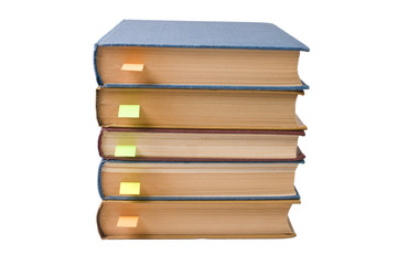 stack of books with bookmarks