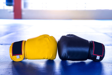 boxing gloves or martial arts gear on a rubber floor gym