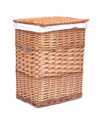 Natural wicker laundry basket isolated on white background