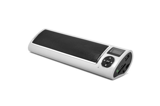 Wireless Bluetooth loudspeaker, mp3 player and radio for computer notebook and smart phone on white background.