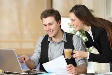 Partners coworking online at office