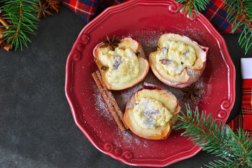 Holiday dessert - baked apples with cottage cheese, raisins, honey and cinnamon