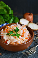 Marinated, sour cabbage with carrots and onions