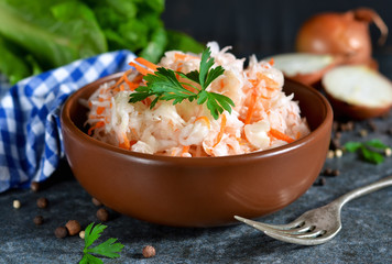 Marinated, sour cabbage with carrots and onions