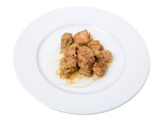 Stewed pork fillet with onions.