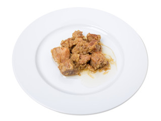 Stewed pork fillet with onions.