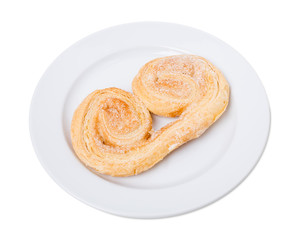 Obraz na płótnie Canvas Rolled puff biscuit with sugar.