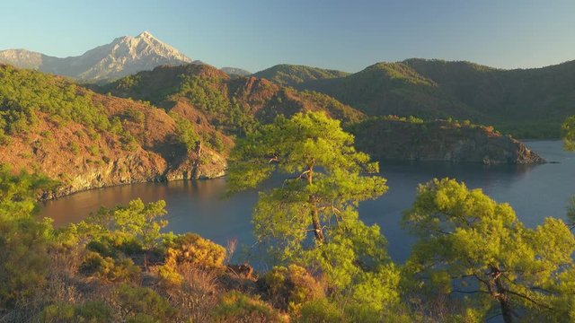 View from Lycian way to blue lagoon and Tahtali mauntain in Turkey. Panning shot, UHD, 4K

