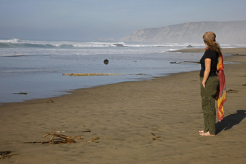 jill standing by ocean