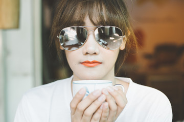 Woman drinking coffee for relaxed.
