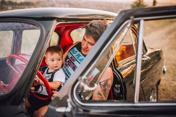 Adorable baby boy in the car