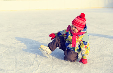 cute little girl learning to skate in winter © nadezhda1906