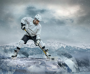 Fototapeta na wymiar Ice hockey player on the ice