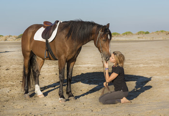 horsewoman on the beach
