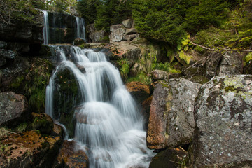 Obraz na płótnie Canvas Waterfall on Jedlova creek in Jizera mountains