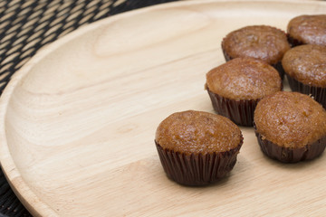 banana cake on the wooden board with abstract nature blur background