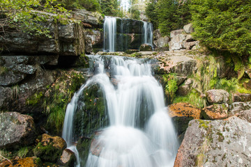 Fototapeta na wymiar Waterfall on Jedlova creek in Jizera mountains
