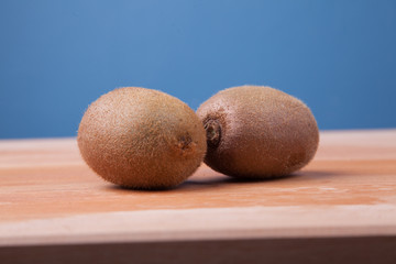 Kiwifruit on wooden table