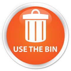 Use the bin (trash icon) orange glossy round button