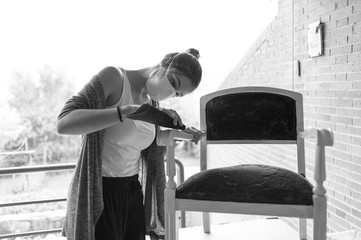 young woman restoring her chair