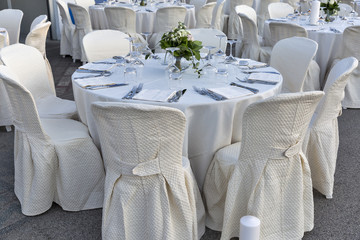 Outdoor restaurant tables served for banquet
