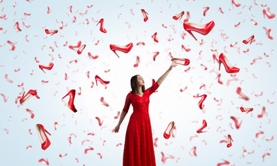 Obraz na płótnie Canvas Woman in passionate red dress . Mixed media