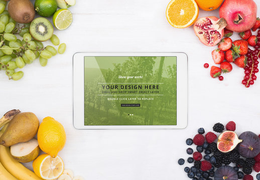 Tablet Surrounded by Fruit Mockup