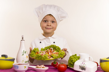 Chef preparing salad with prawns