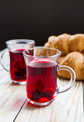 Fresh Croissants and cups of hot hibiscus tea