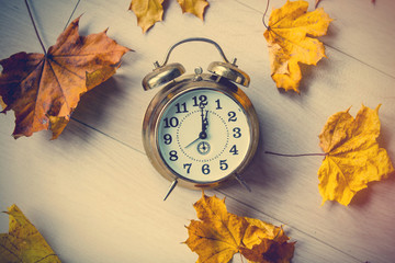 Vintage alarm clock with leaves