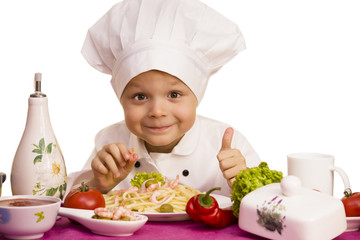 Chef preparing pasta with shrimp