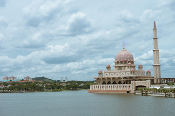 Fototapeta na wymiar pink mosques putrajayas roof dome and river in kuala lumpur city tour day time outdoor / pink mosques