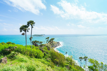 Fototapeta na wymiar Phromthep Cape, beautiful Andaman sea view in Phuket island, Thailand. Blue sky and turquoise color sea.