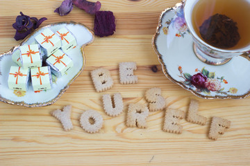 Be Yourself, inspirational slogan made from biscuit letters