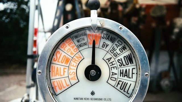 Traditional engine order telegraph or E.O.T., often known as a chadburn is a communications device used on a ship detail panning on old ship, cinematic, hystoric