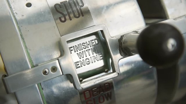 Traditional engine order telegraph or E.O.T., often known as a chadburn is a communications device used on a ship detail panning on old ship, cinematic, hystoric