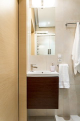 Obraz na płótnie Canvas Beige and brown bathroom design