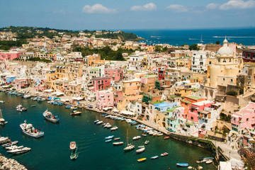 The charming port of Corricella with its colorful fishermen  houses, island of Procida, Naples, Italy