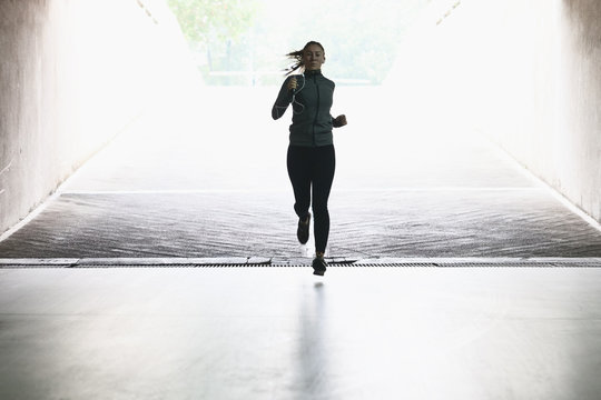 Young woman running in an urban environment