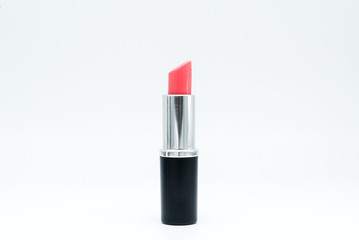 Pink lipstick isolated on white background