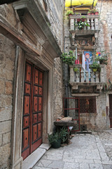 ornate door n stone balconies