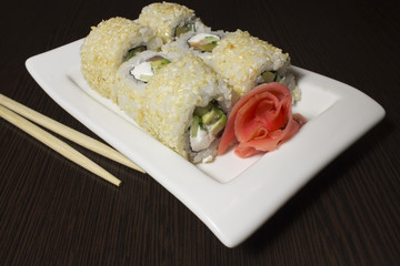 Beautifully decorated sushi on a plate.