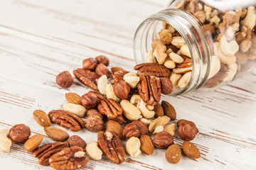 Mix of different nuts closeup photo