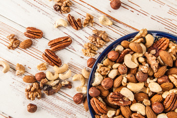 Mix of different nuts closeup photo