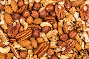 Mix of different nuts closeup photo