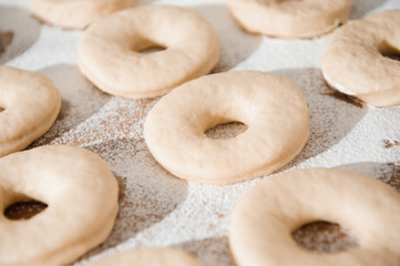 Chef preparing dough - cooking donuts process